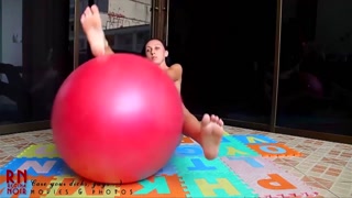 Naked yoga Naked gymnastics. Young beauty babe on fitball. Part