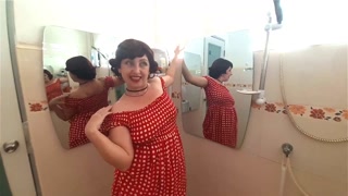 Pinup babe has no panties in front of mirror Retro Vintage Nude maid Housewife