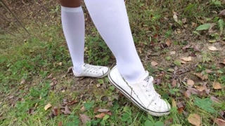 Schoolgirl in white knee socks walk nature foot feet fetish under skirt