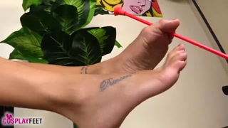 Barefoot Indian pulls arrows with her toes