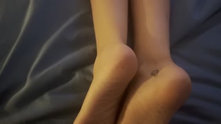 Girlfriend Gives Footjob and Gets Soles Covered in Cum