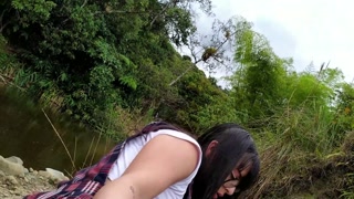 Beautiful schoolgirl is fucked in the public river.