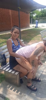 two athletes touching each other and licking pussy in the park