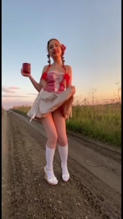 In the field showing my ass to passing cars