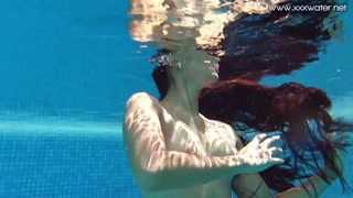 Small tits Latina babe Andreina Deluxe underwater
