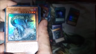Yugioh Unboxing Gold Sarc MegaTin! God card included?