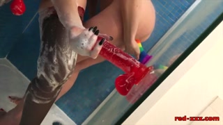 Mature redhead plays in the shower with her girlfriend