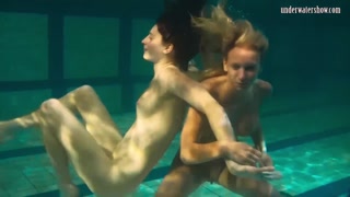 Babes swim strip and have fun underwater
