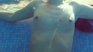 Kittina Ivory acts in underwater erotics