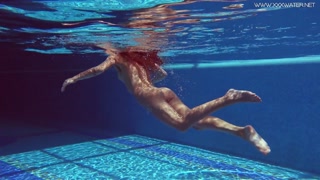 Euro pornstar Tiffany Tatum swims and masturbates