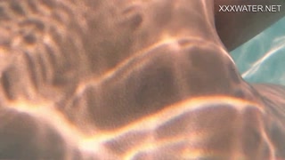 Lidia Skukoha masturbates in the swimming pool