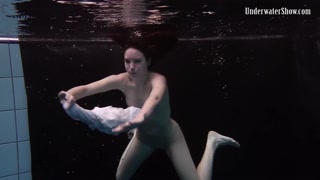 Redhead beauty in the white dress