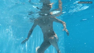 Smoking hot Hungarian Bonnie chick swimming