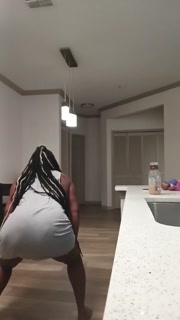 His wife in the kitchen twerking