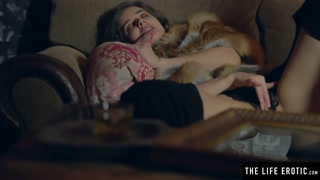 Watching herself in the mirror as she masturbates to an orgasm