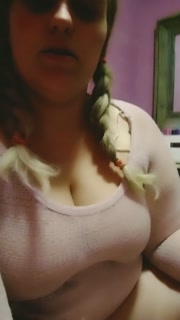 Smoking a cigarette in pink with braids